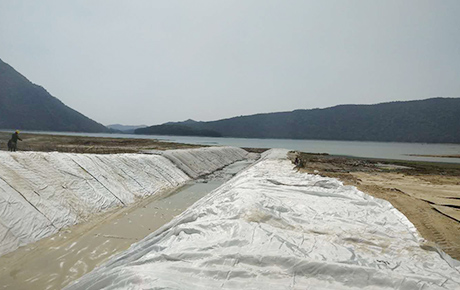 What is the purpose of sand bags on the beach?